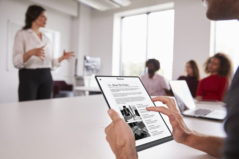 PaperSmart Student holding