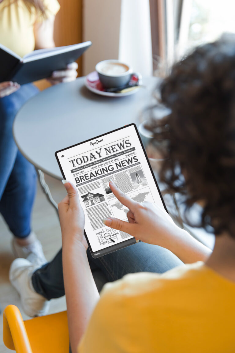 crop-teenager-using-tablet-table
